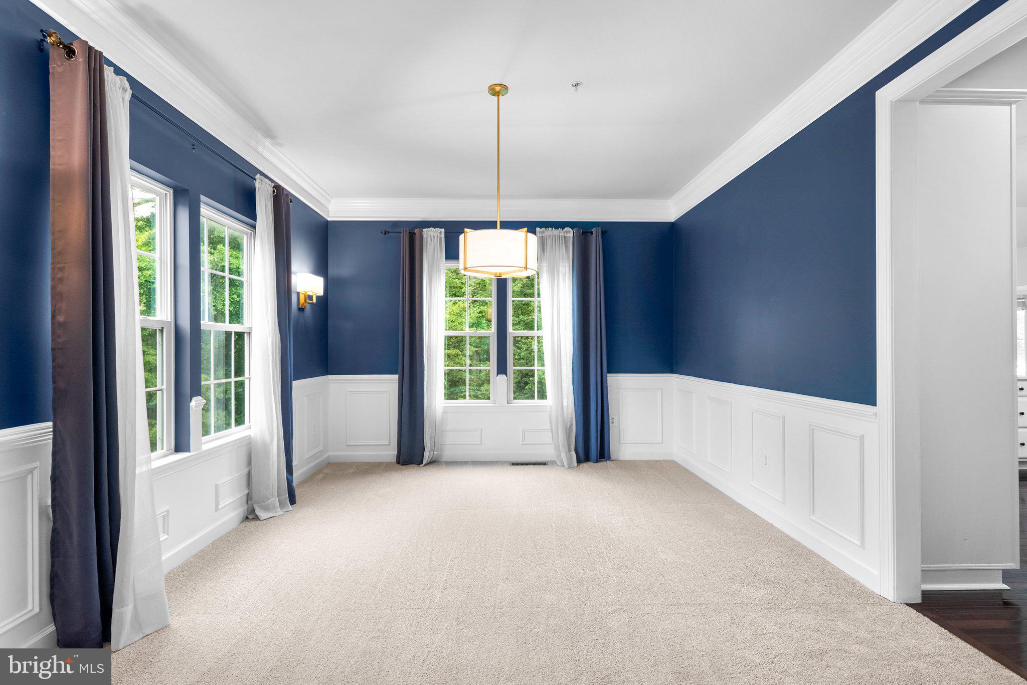 8304 Cedarview Court Clinton, MD 20735 - Photo 8 of 39 a view of an empty room with glass door and balcony