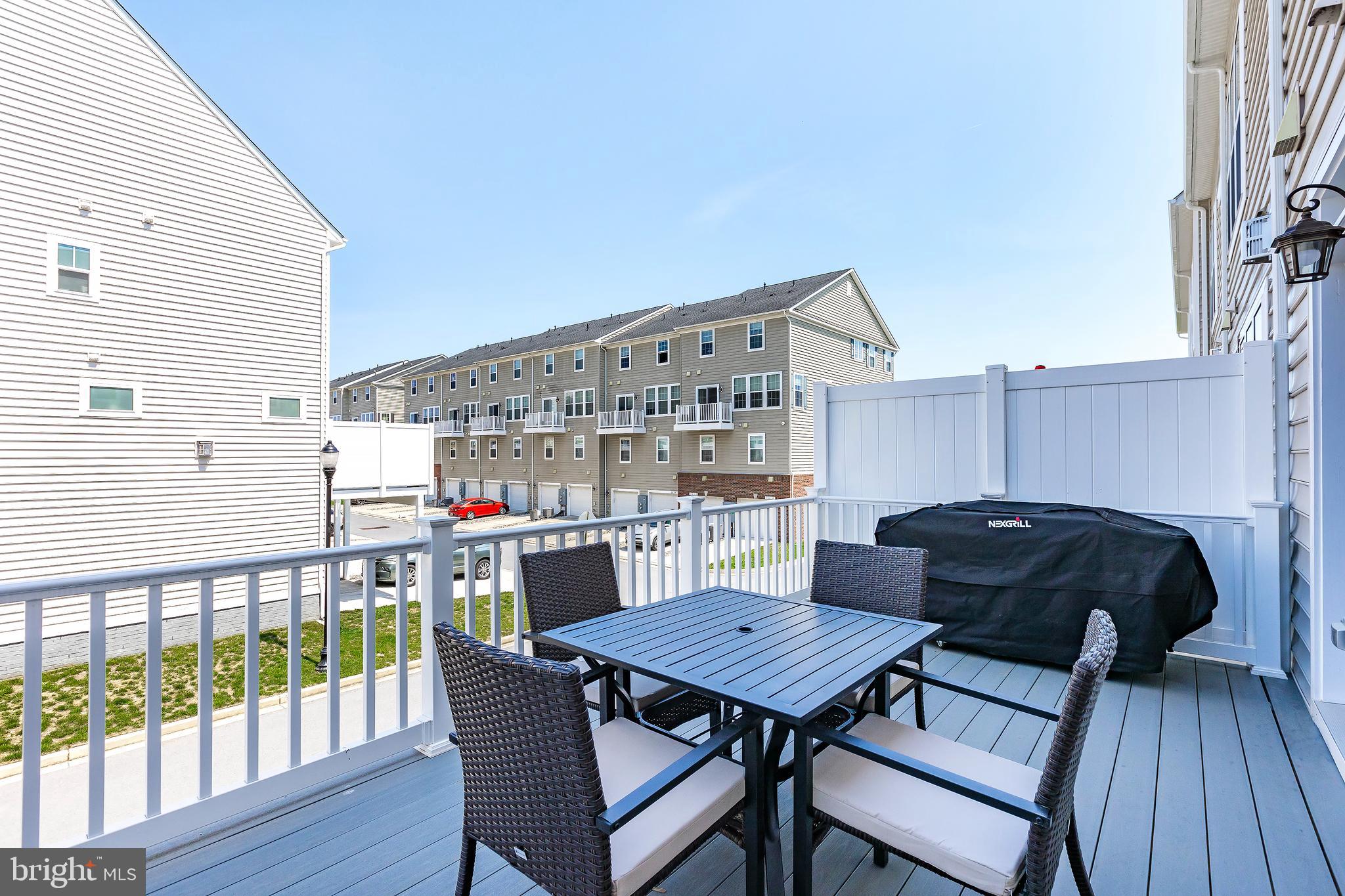 1096 Holden Road Frederick, MD 21701 - Photo 18 of 51 a view of a chairs and table on the deck