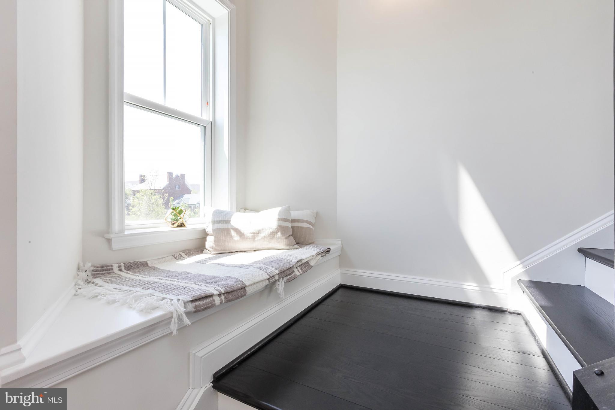 1096 Holden Road Frederick, MD 21701 - Photo 22 of 51 a bathroom with a granite countertop sink and a window