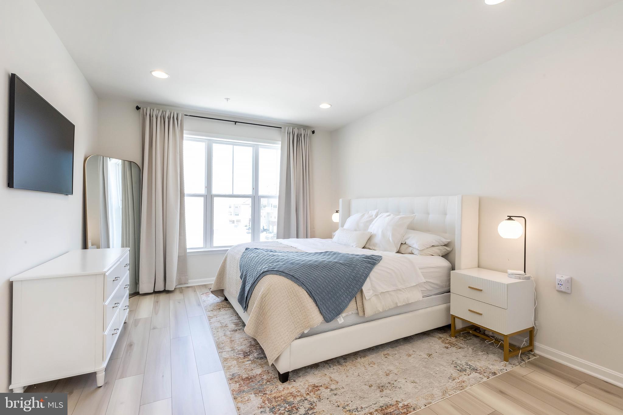 1096 Holden Road Frederick, MD 21701 - Photo 24 of 51 a spacious bedroom with a bed and a large window