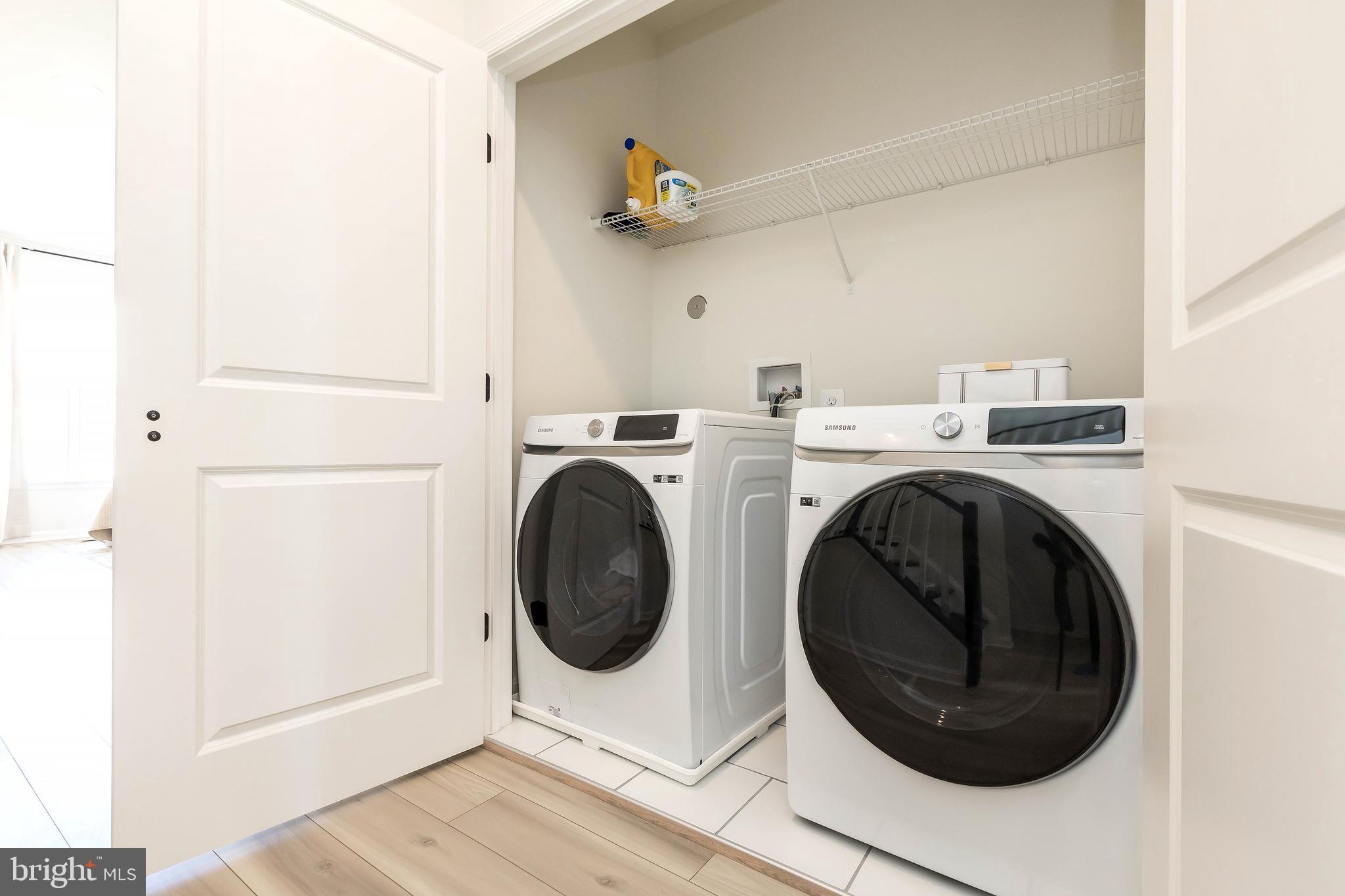 1096 Holden Road Frederick, MD 21701 - Photo 28 of 51 a view of washer and dryer in a utility room