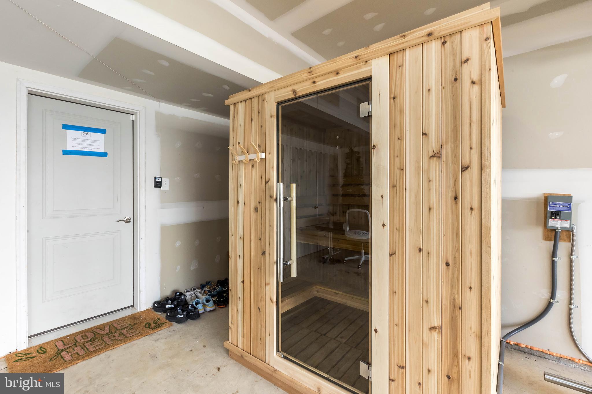 1096 Holden Road Frederick, MD 21701 - Photo 46 of 51 a view of a bathroom with a shower and a sink
