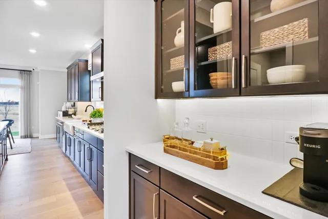 a kitchen with a sink and cabinets