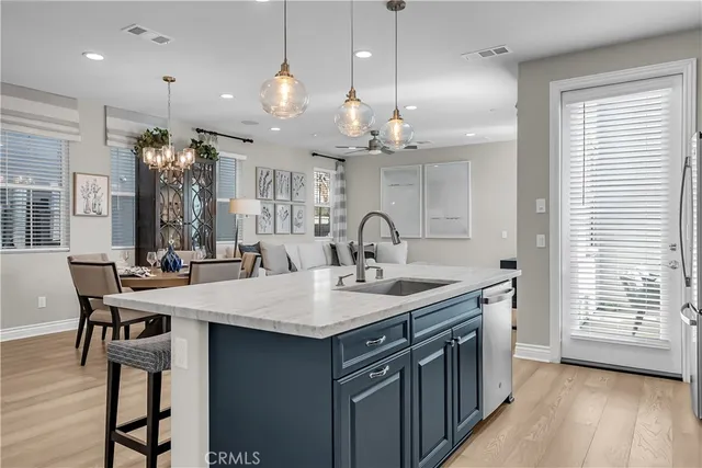 a kitchen with a table and chairs in it