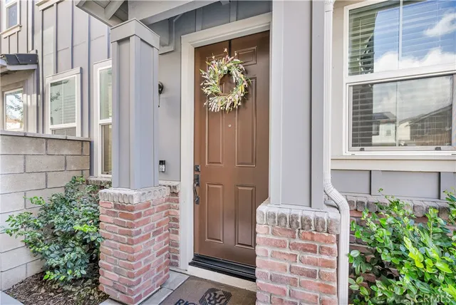 a front view of a house with a glass door