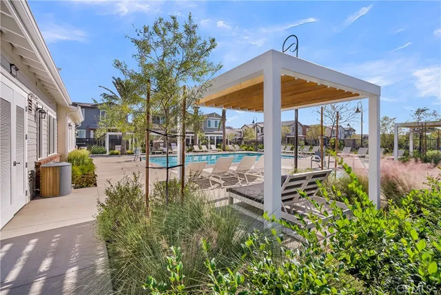 a view of a swimming pool with a patio