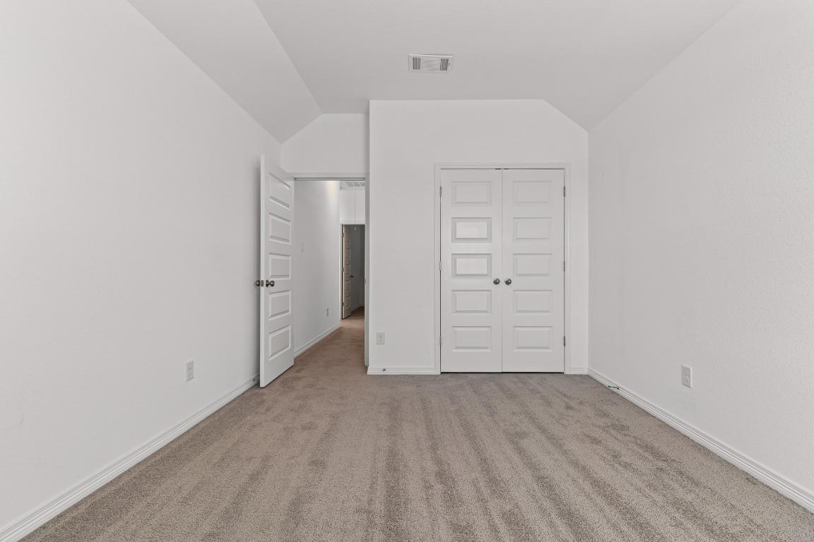 20520 Carries Ranch Road Pflugerville, TX 78660 - Photo 22 of 32 wooden floor in an empty room