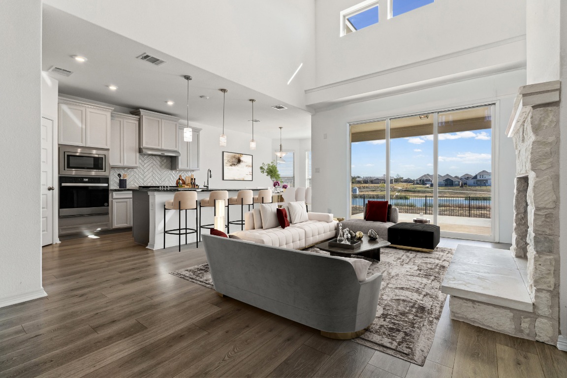 20520 Carries Ranch Road Pflugerville, TX 78660 - Photo 5 of 32 a living room with furniture and a large window