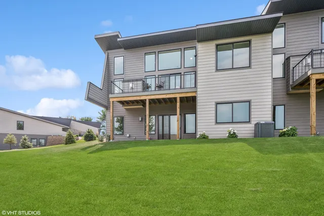 a big house with a big yard and more windows