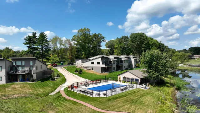a aerial view of a house with a big yard