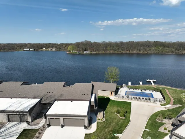 an aerial view of a house with outdoor space