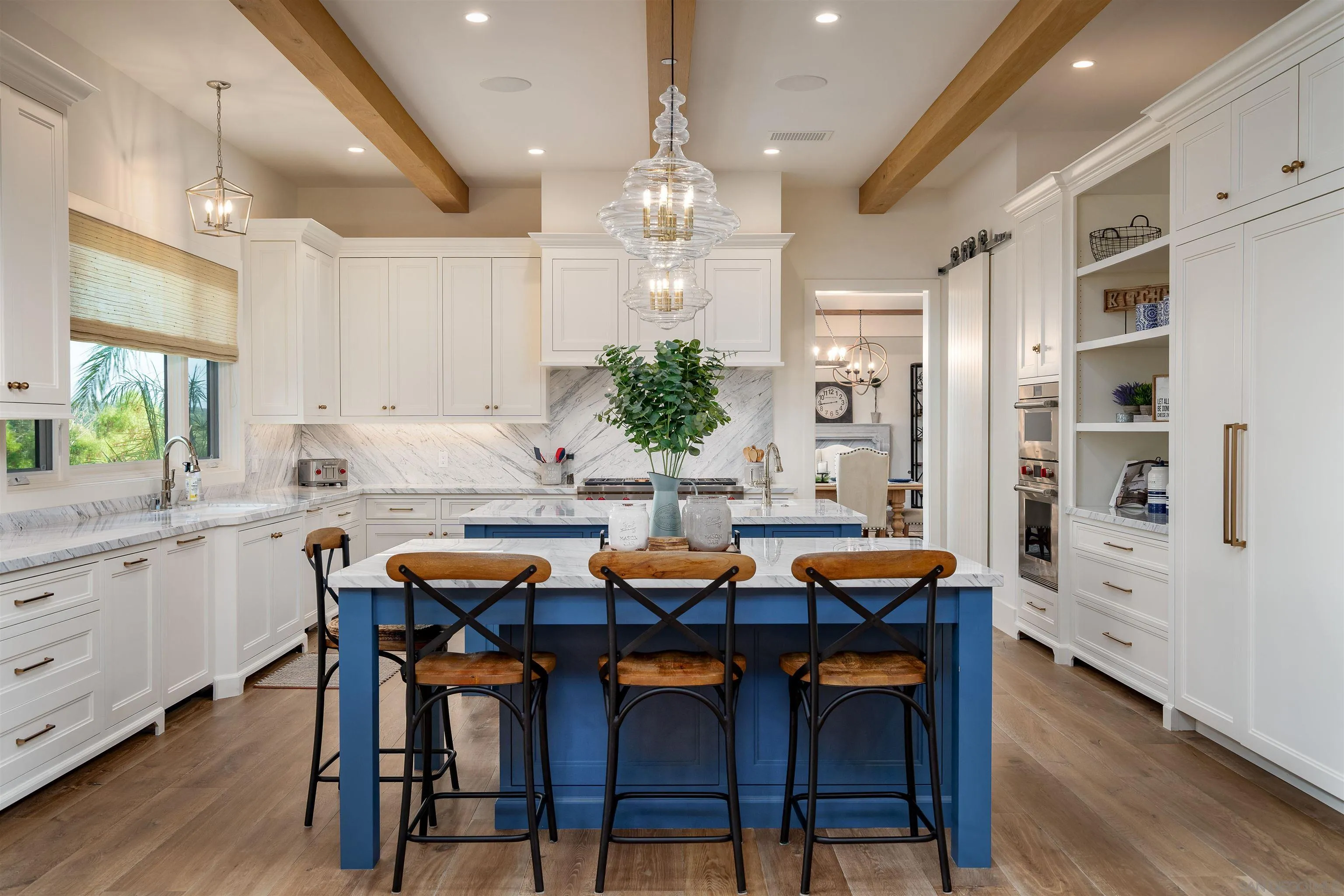 3419 Via Monteverde Encinitas, CA 92024 - Photo 16 of 73 a view of a dining room with furniture and wooden floor