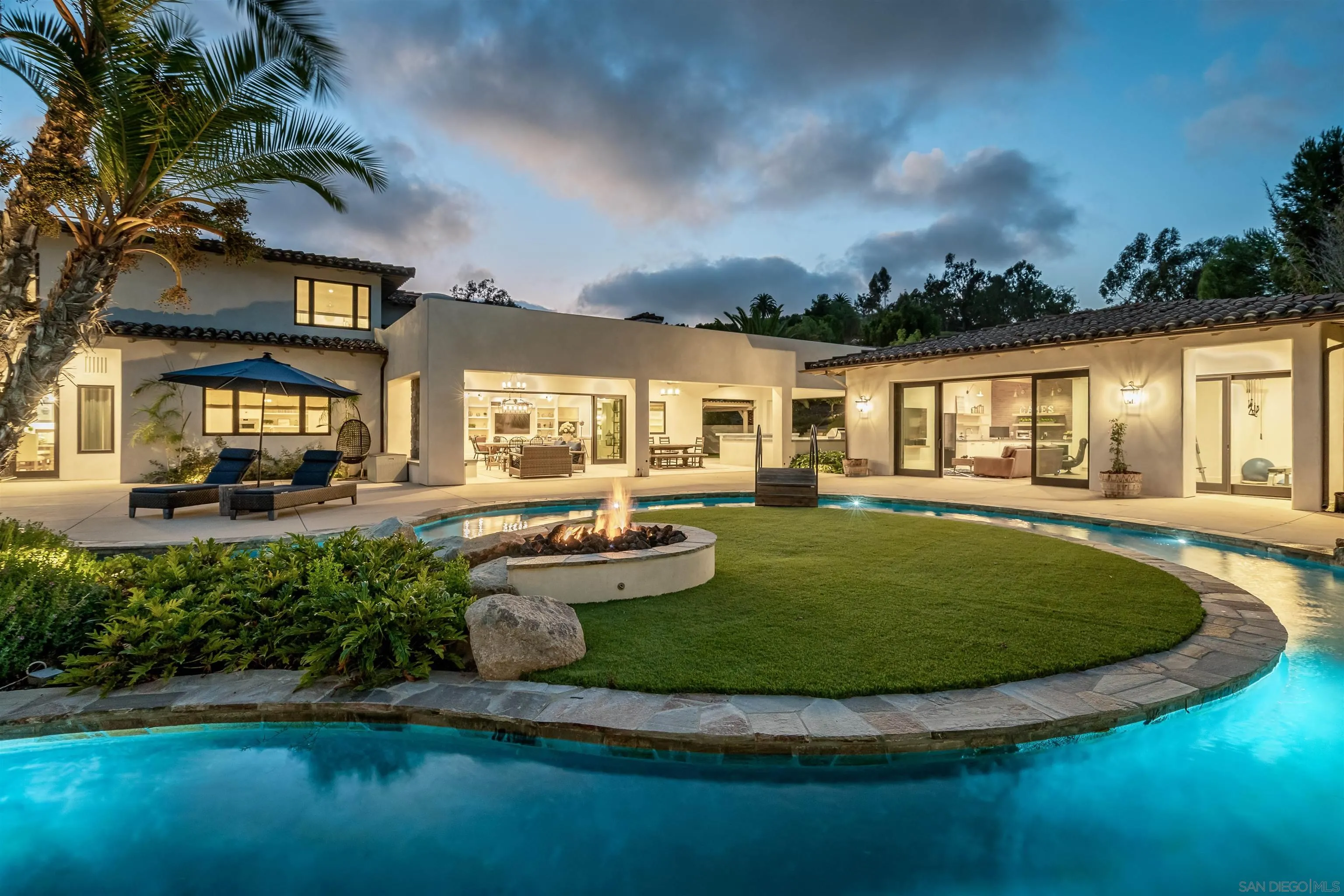 3419 Via Monteverde Encinitas, CA 92024 - Photo 2 of 73 a view of a house with swimming pool and sitting area