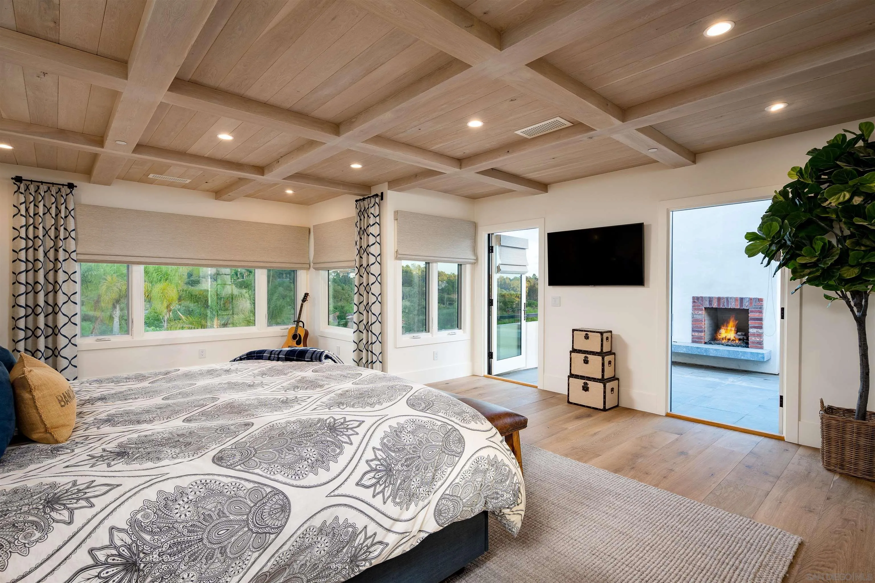 3419 Via Monteverde Encinitas, CA 92024 - Photo 21 of 73 a spacious bedroom with a bed and a large window
