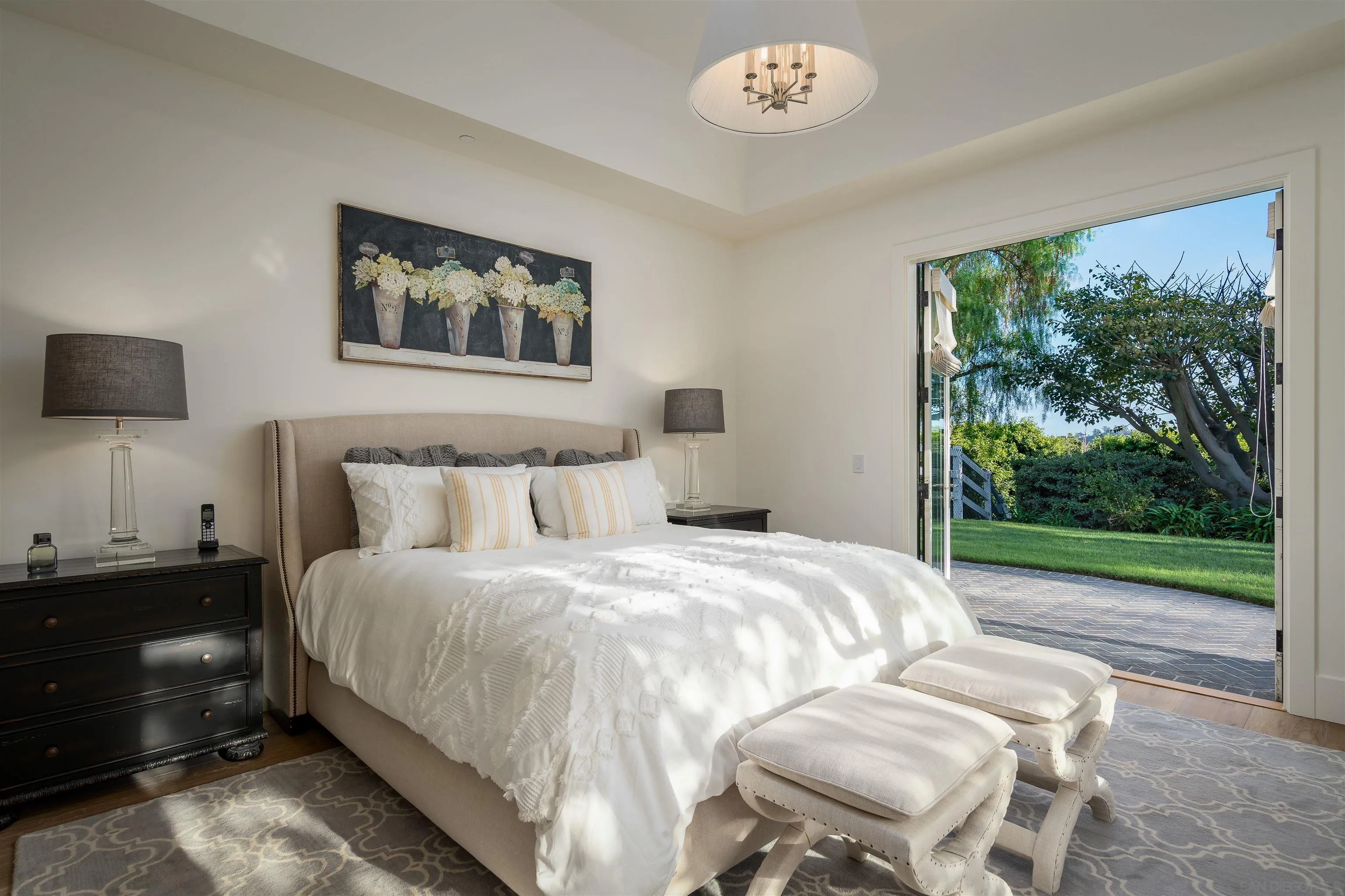 3419 Via Monteverde Encinitas, CA 92024 - Photo 36 of 73 a bedroom with a bed and a large window