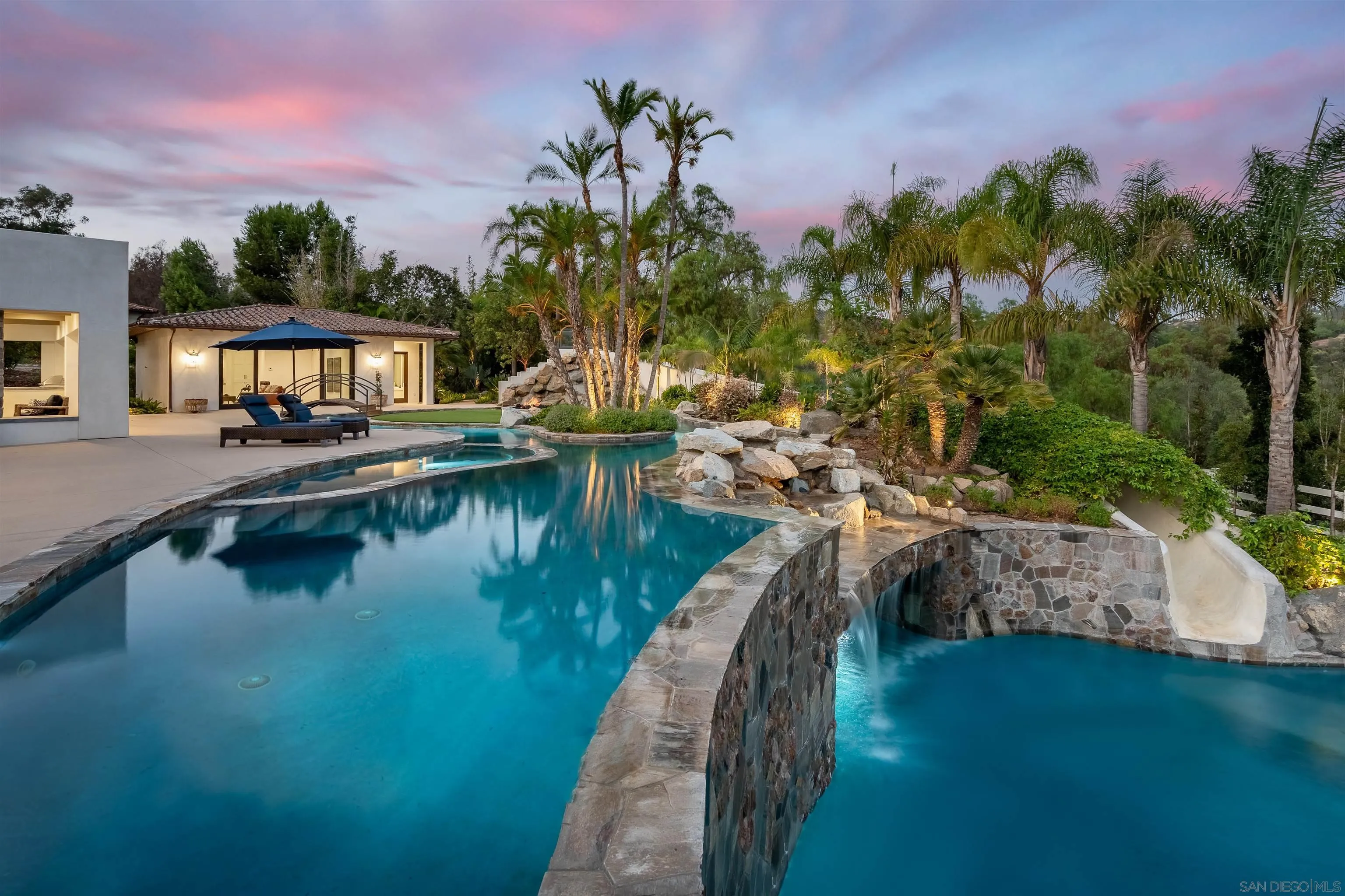 3419 Via Monteverde Encinitas, CA 92024 - Photo 49 of 73 a view of a lake with a house in the background