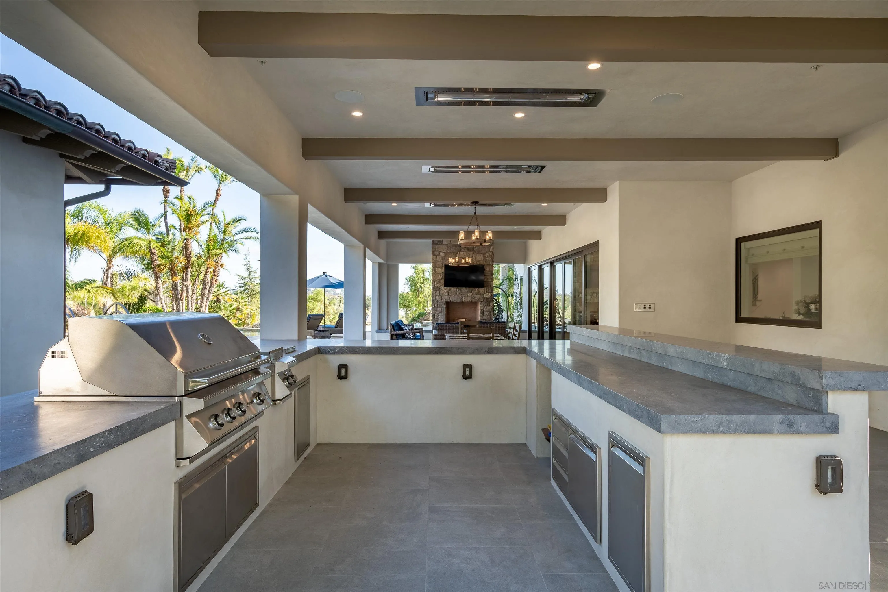 3419 Via Monteverde Encinitas, CA 92024 - Photo 53 of 73 a kitchen with stainless steel appliances granite countertop a sink and a stove