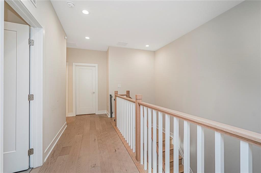 22 Edmund Way, Unit 22 Middletown, NJ 07748 - Photo 12 of 17 a view of a hallway with wooden floor