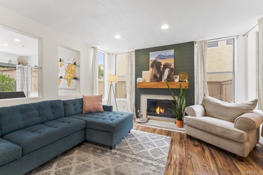 305 Cobblestone Place Santee, CA 92071 - Photo 1 of 41 a living room with furniture and a fireplace