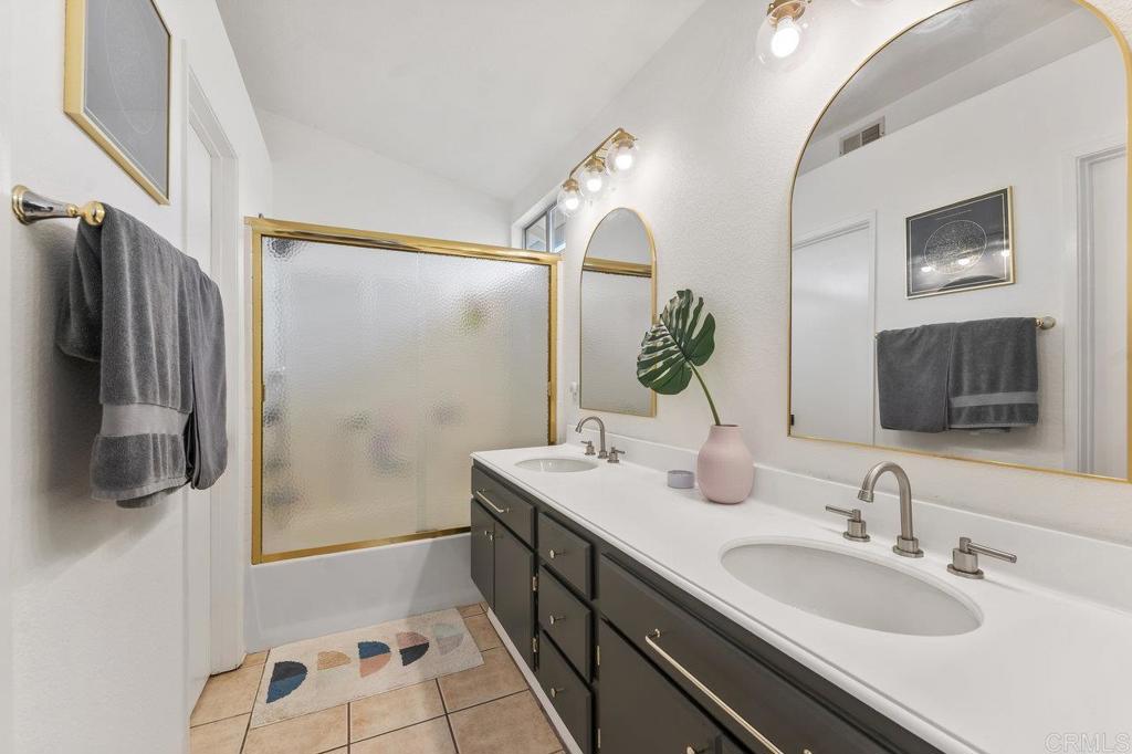 305 Cobblestone Place Santee, CA 92071 - Photo 20 of 41 a bathroom with double vanity and a mirror