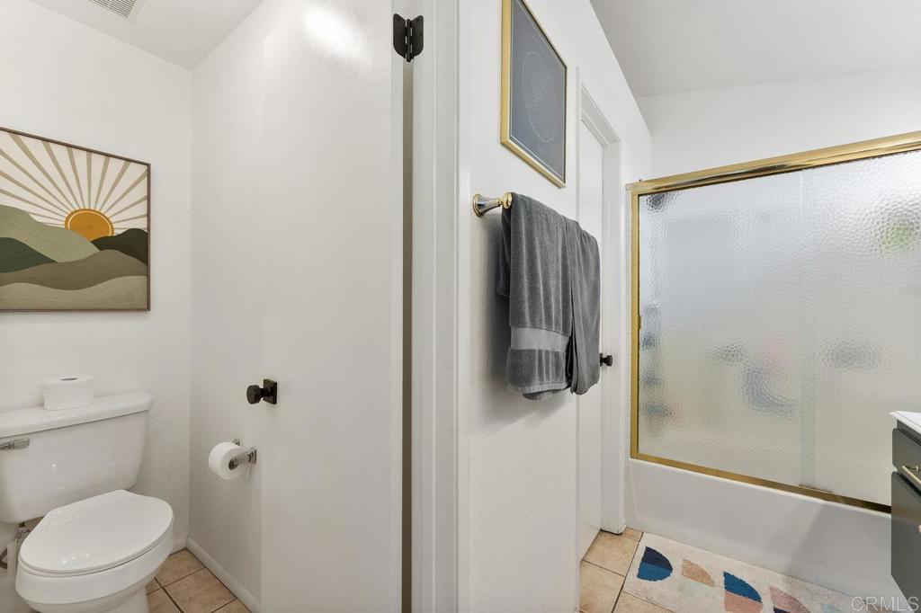 305 Cobblestone Place Santee, CA 92071 - Photo 21 of 41 a bathroom with a shower and toilet
