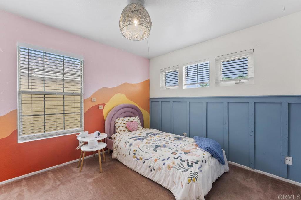 305 Cobblestone Place Santee, CA 92071 - Photo 22 of 41 a bedroom with a bed and a window