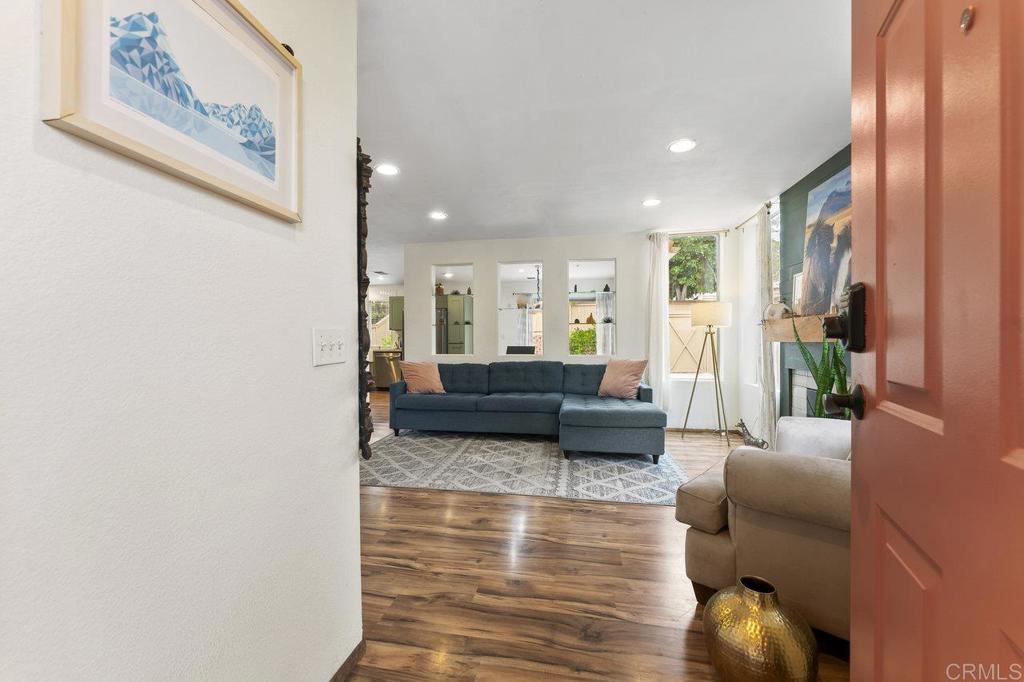 305 Cobblestone Place Santee, CA 92071 - Photo 5 of 41 a living room with furniture and a wooden floor