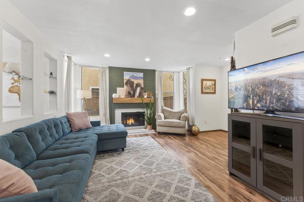305 Cobblestone Place Santee, CA 92071 - Photo 6 of 41 a living room with furniture and a fireplace
