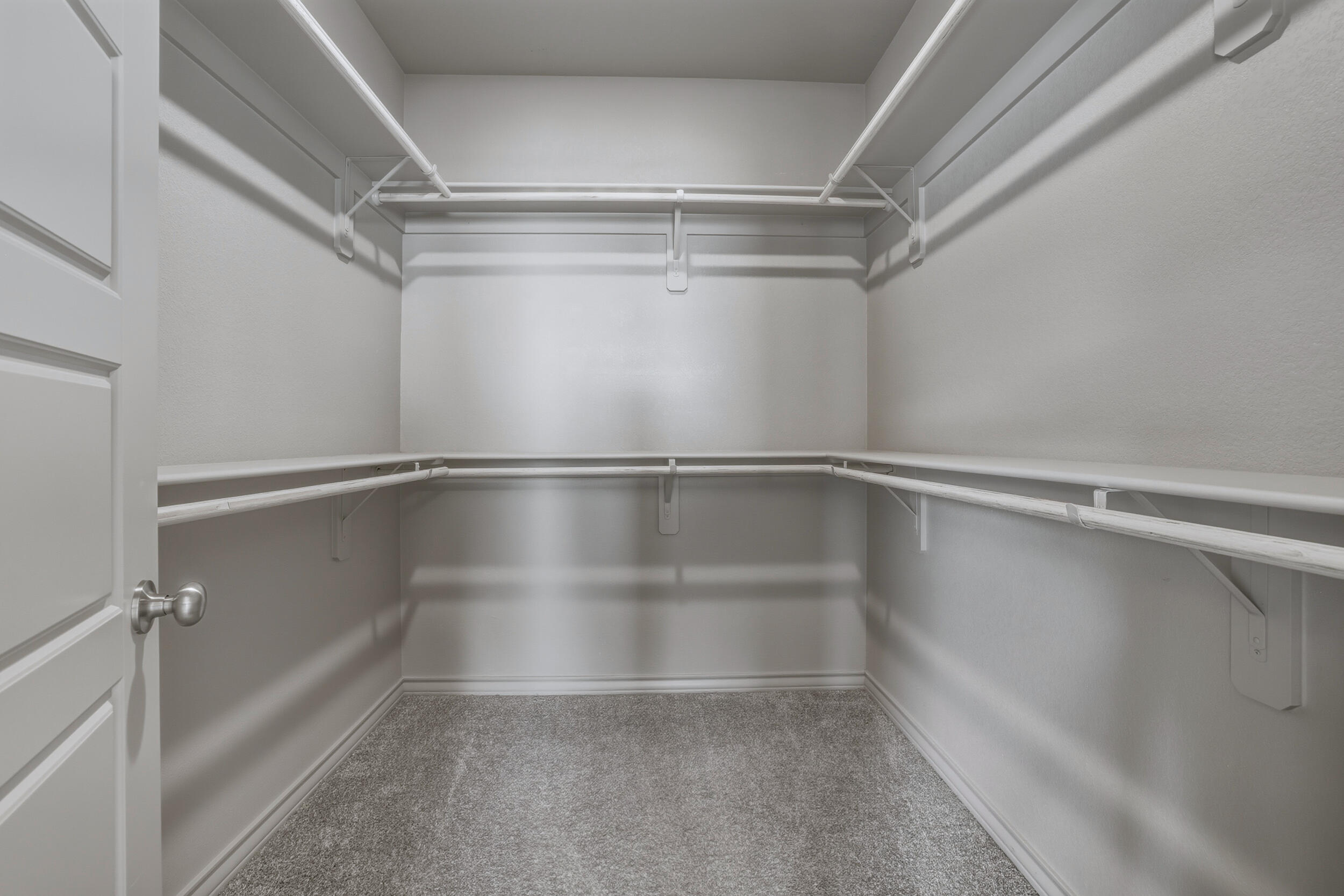 7103 22nd Street Lubbock, TX 79407 - Photo 17 of 30 a view of an empty walk in closet