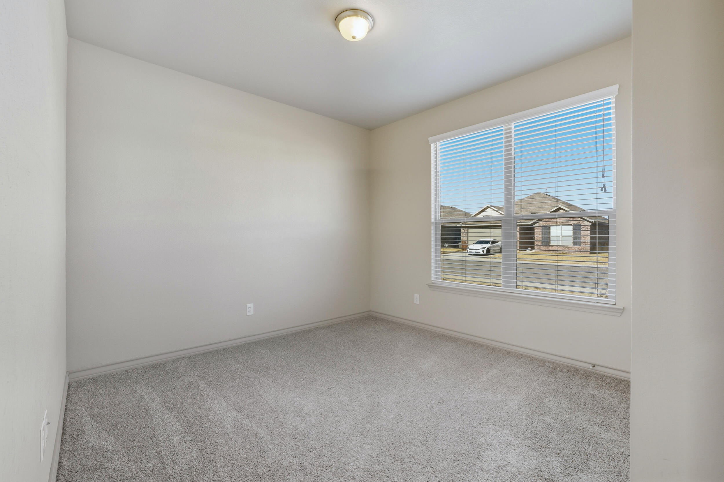 7103 22nd Street Lubbock, TX 79407 - Photo 20 of 30 a view of empty room with windows