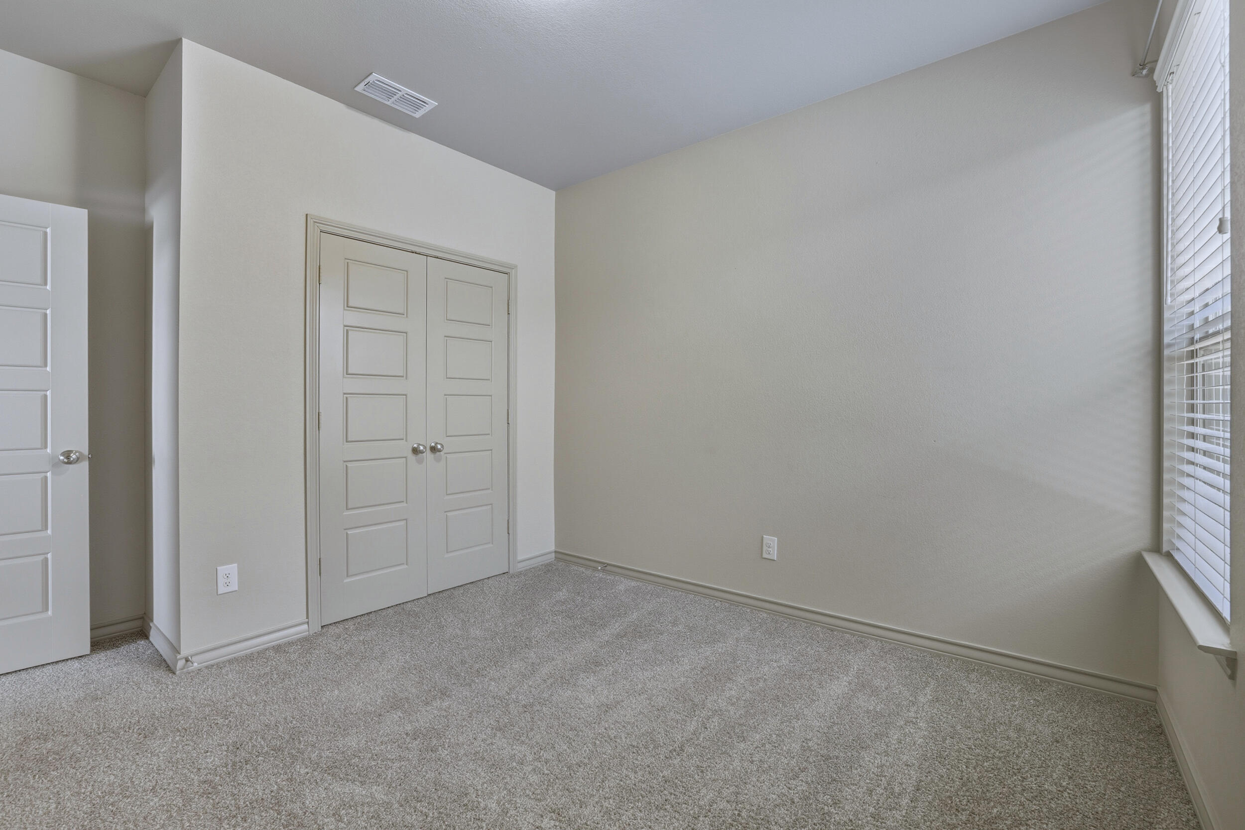 7103 22nd Street Lubbock, TX 79407 - Photo 23 of 30 an empty room with windows