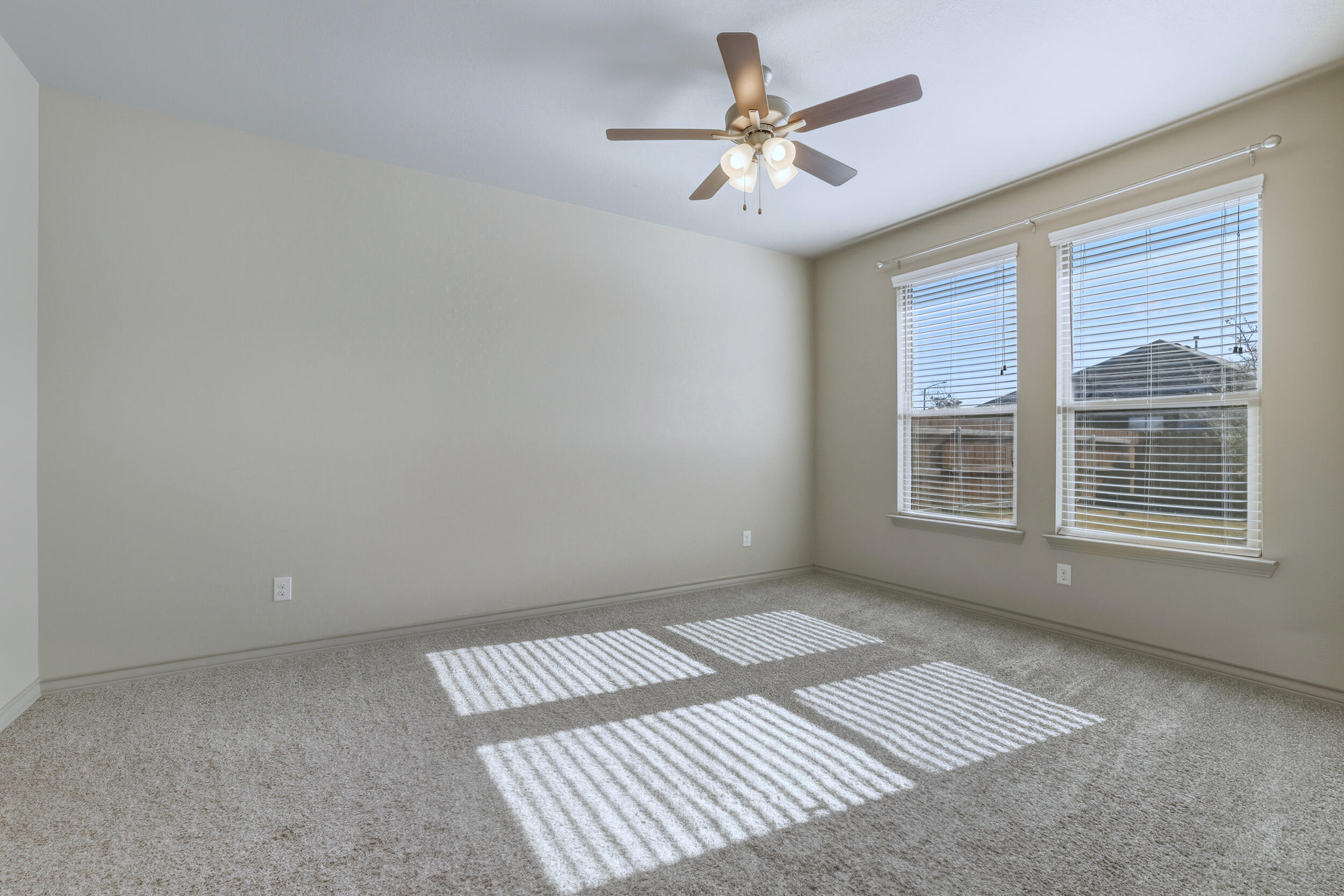 7103 22nd Street Lubbock, TX 79407 - Photo 24 of 30 a view of an empty room with a window