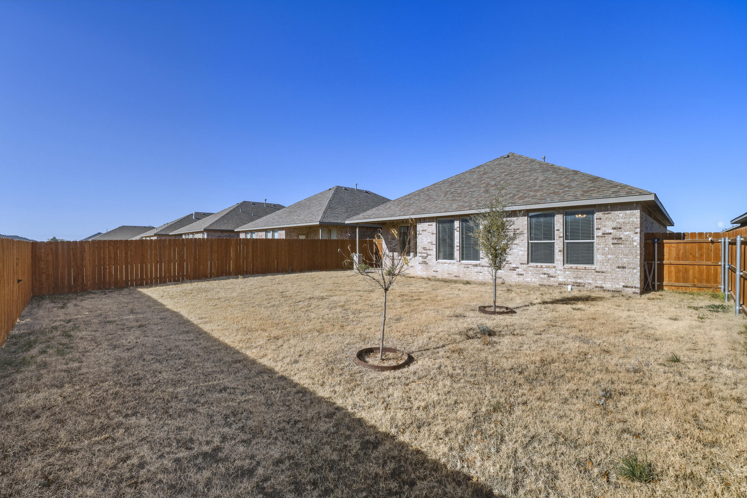 7103 22nd Street Lubbock, TX 79407 - Photo 30 of 30 a backyard of a house