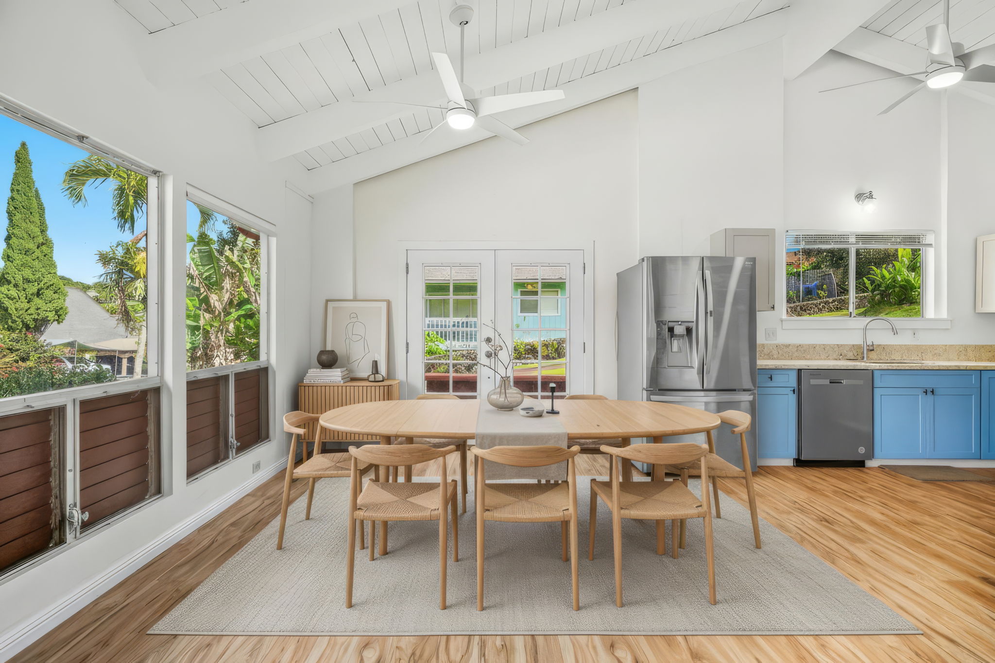 388 Molo Street Kapaa, HI 96746 - Photo 7 of 27 a view of a dining room with furniture window and wooden floor