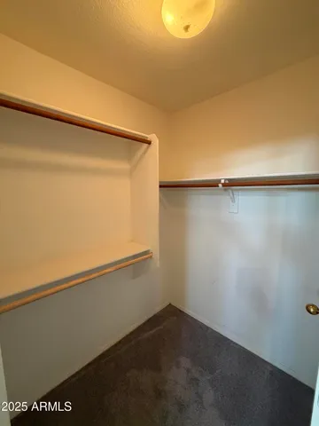 a bathroom with a double vanity sink and mirror