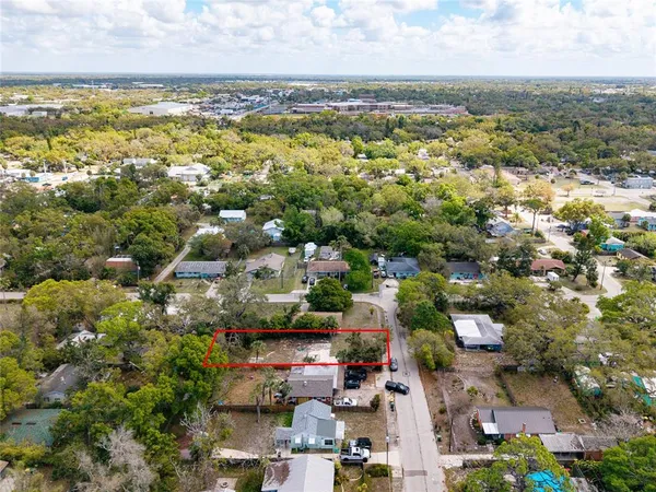 an aerial view of a city with lots of residential buildings