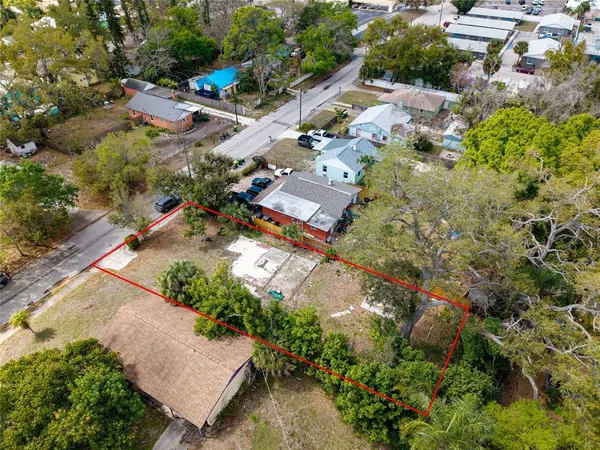 an aerial view of residential house with outdoor space