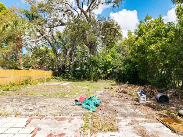 a view of a yard with an outdoor space