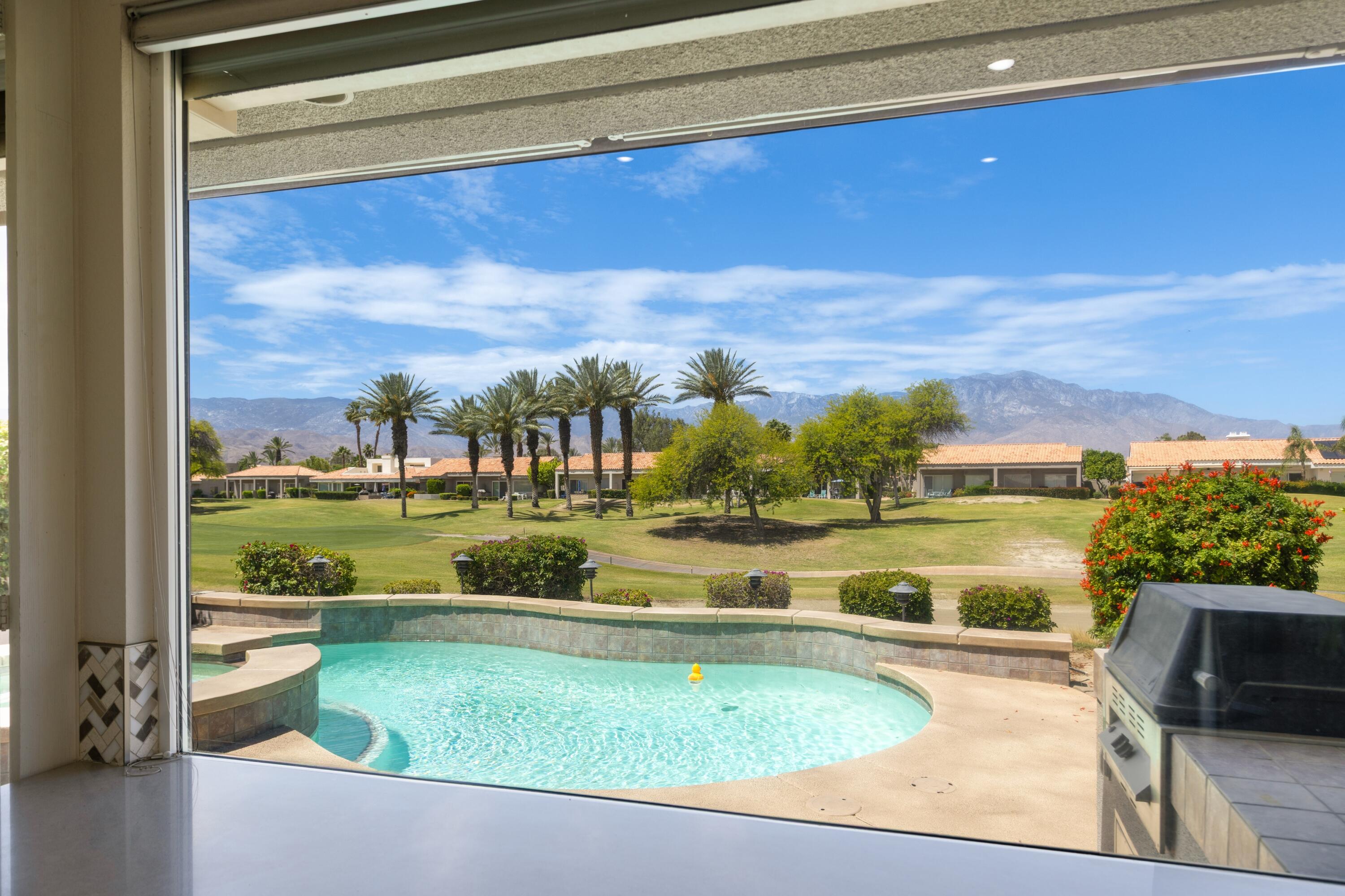39 Augusta Drive Rancho Mirage, CA 92270 - Photo 18 of 53 a view of swimming pool with outdoor seating