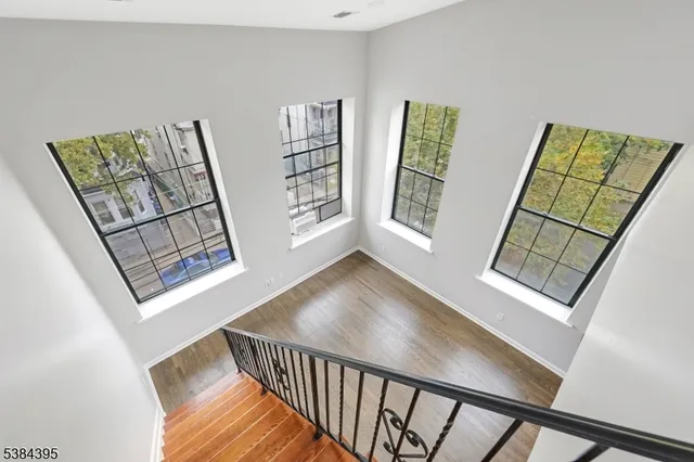 a view of an entryway with hardwood
