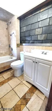a bathroom with a bathtub