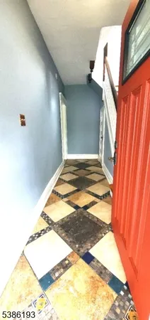 a view of wooden floor and staircase