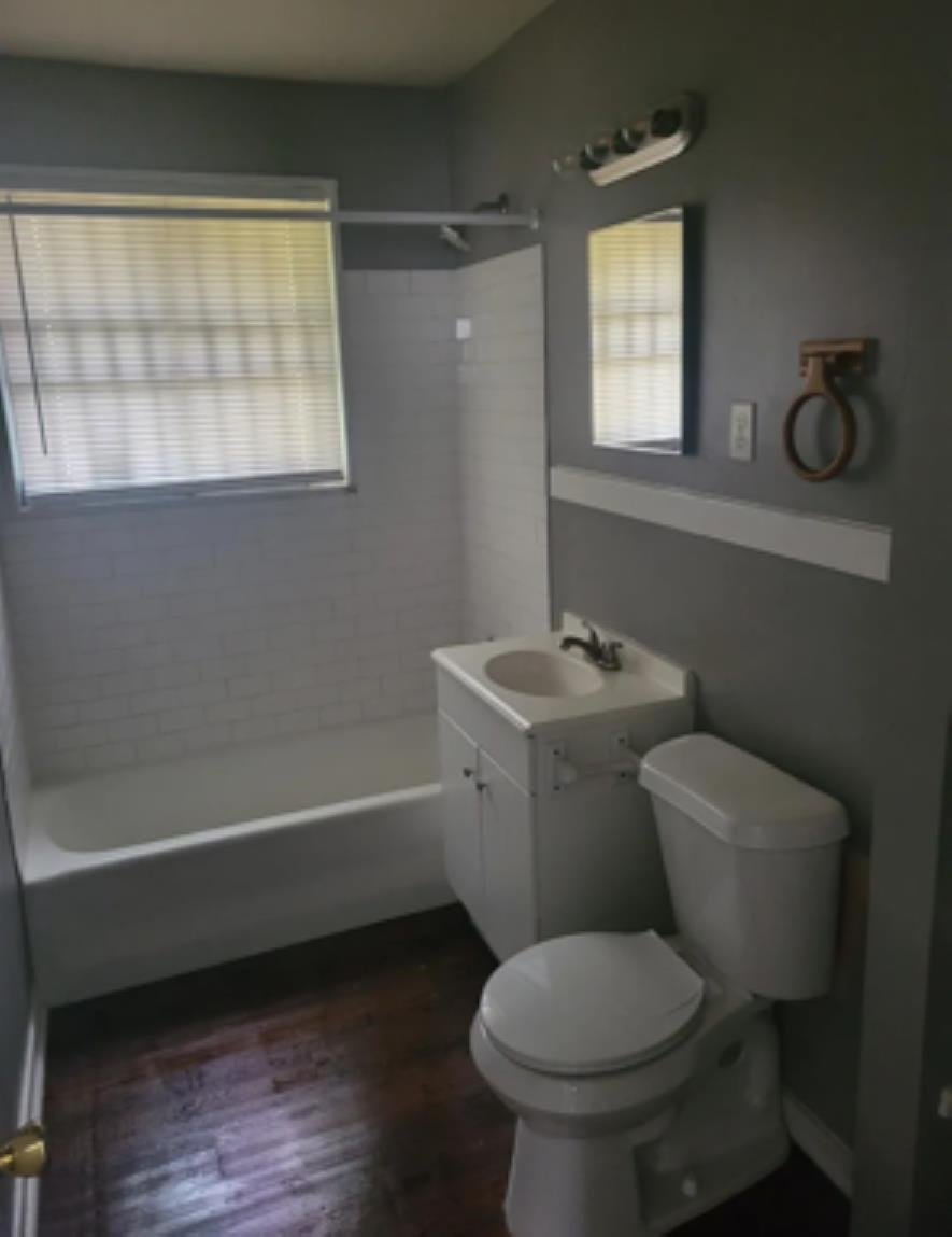 386 Elder Road Memphis, TN 38109 - Photo 9 of 12 a bathroom with a toilet a sink and bathtub