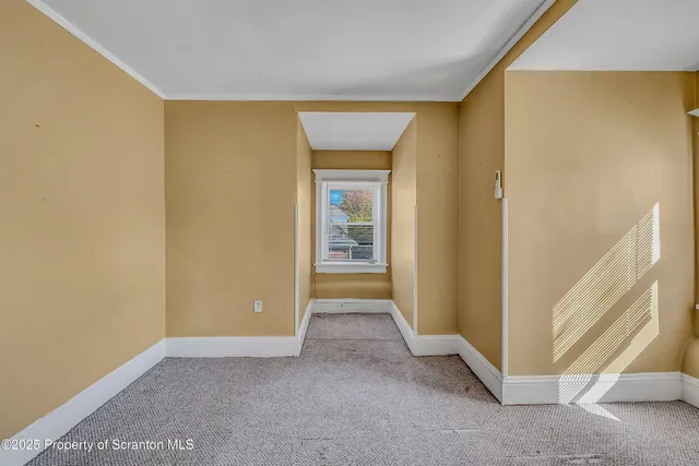 a view of room with walk in closet