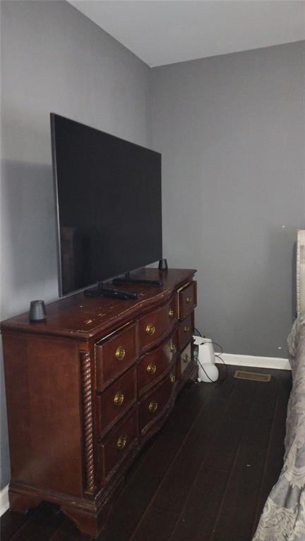 136 Hill Street Commerce, GA 30529 - Photo 27 of 27 a living room with furniture and a flat screen tv