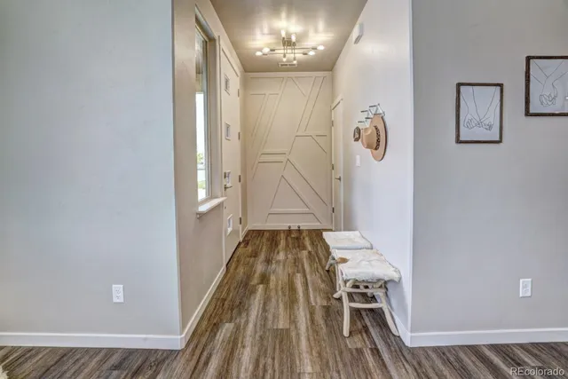 a kitchen with cabinets counter top space and stainless steel appliances