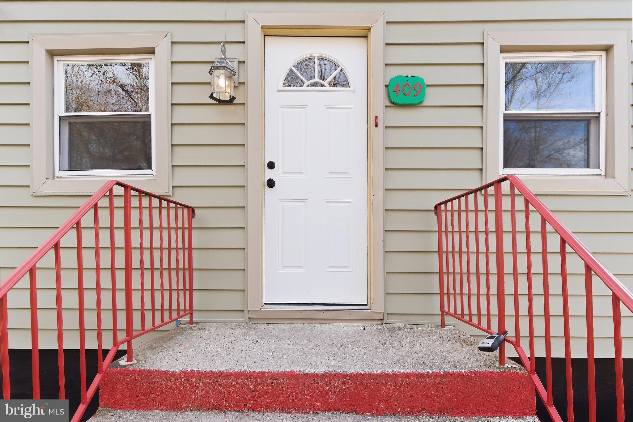 409 Cedar Avenue Lindenwold, NJ 08021 - Photo 1 of 25 a view of front door