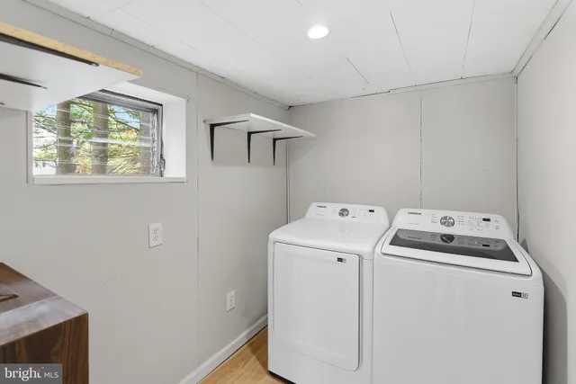 a utility room with dryer and washer