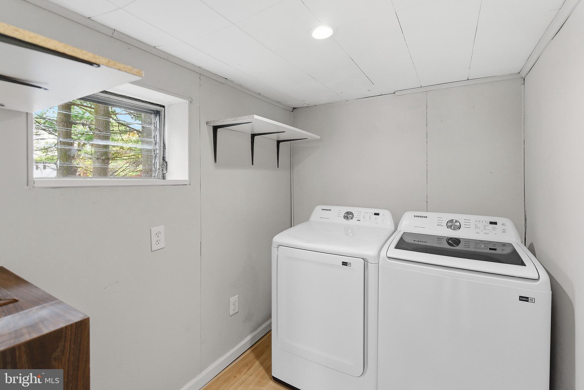 409 Cedar Avenue Lindenwold, NJ 08021 - Photo 13 of 25 a utility room with dryer and washer