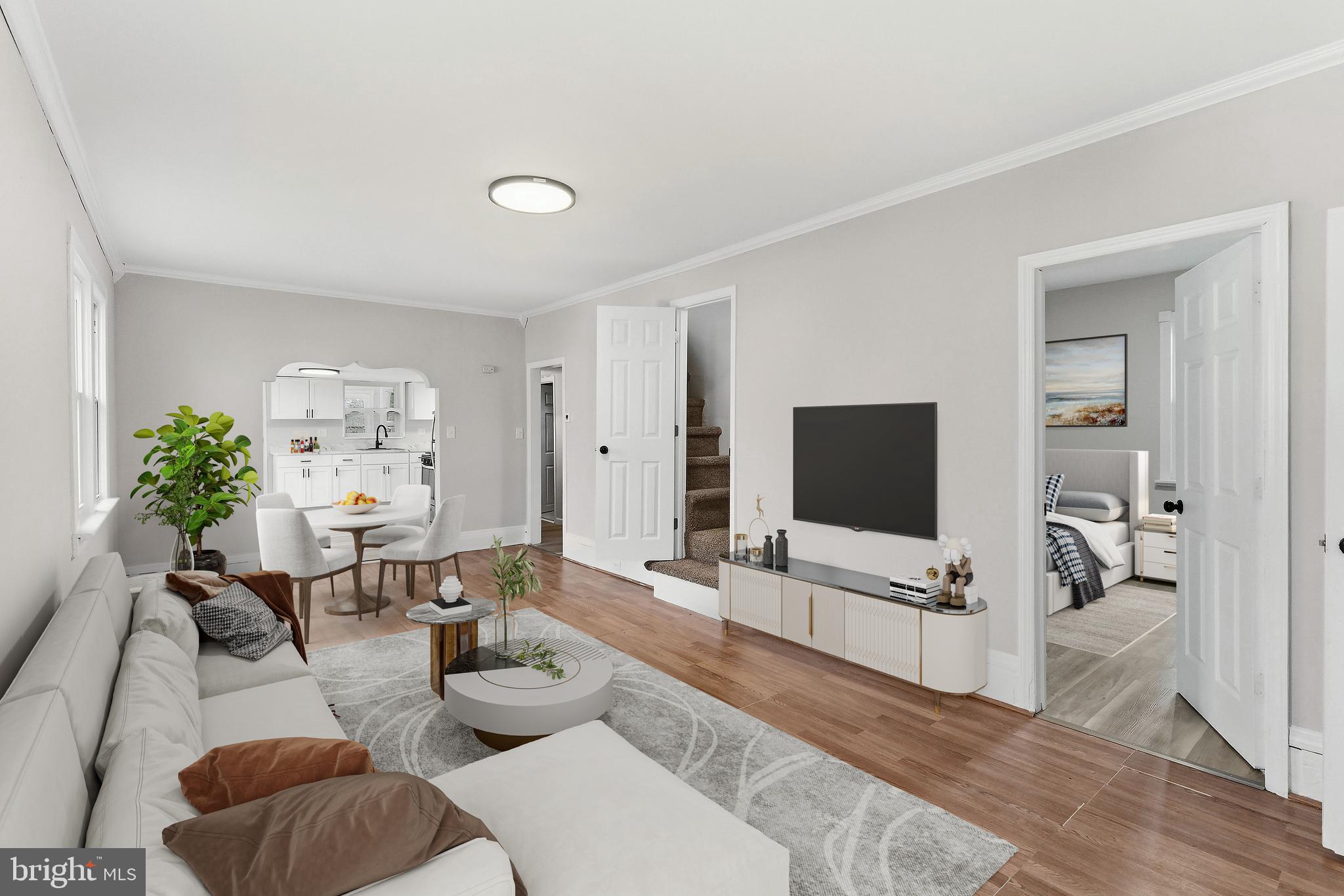 409 Cedar Avenue Lindenwold, NJ 08021 - Photo 6 of 25 a living room with furniture and a flat screen tv